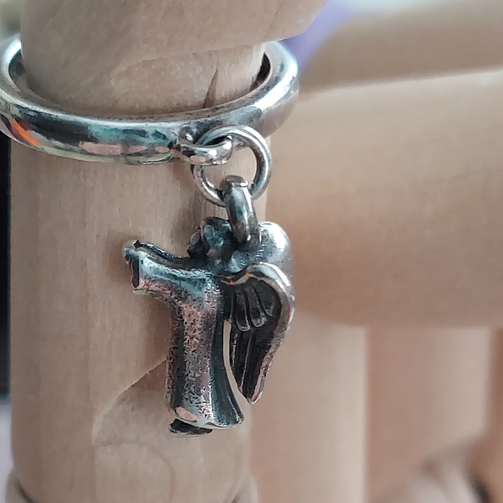 James Avery angel charm on sterling ring size 3
